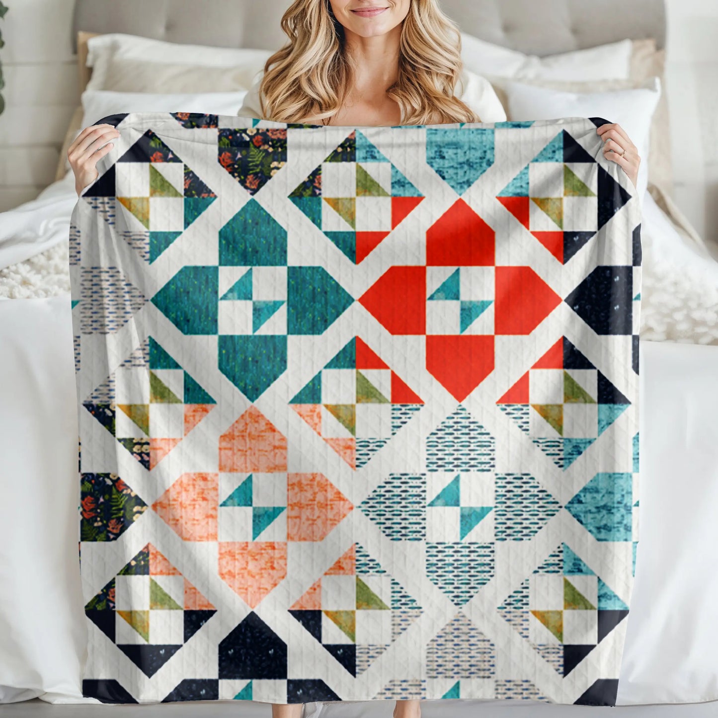 Colorful quilt with a mix of floral and solid prints, arranged in a symmetrical diamond pattern for a striking effect.